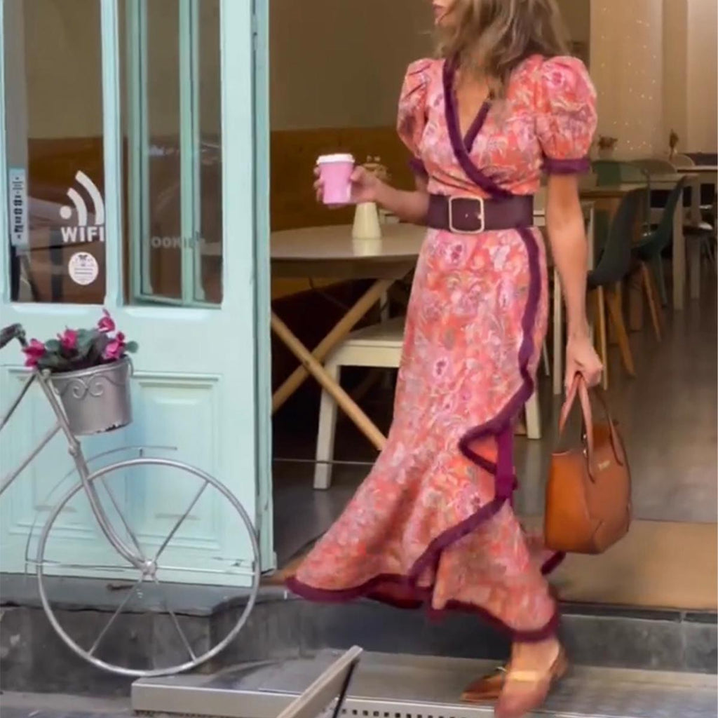 Miriam - Elegante vestido largo con mangas cortas abullonadas y falda asimétrica